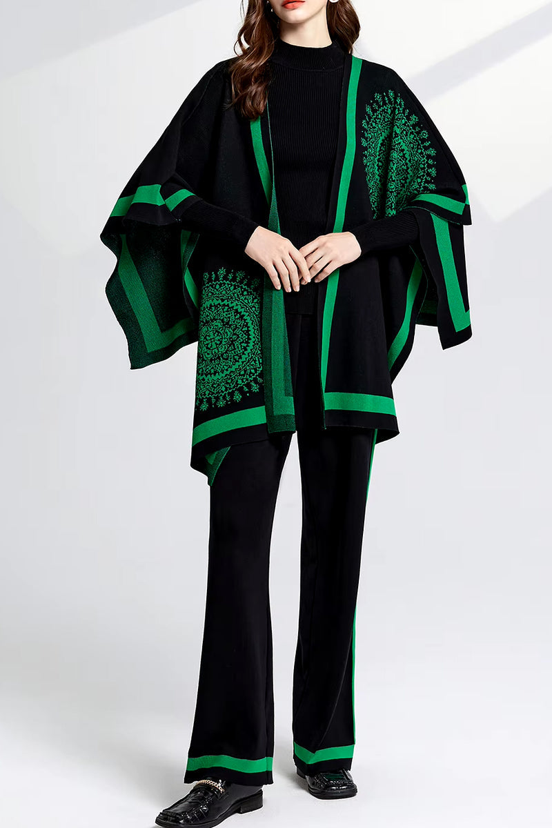 Person wearing a black outfit with green patterns on a white background